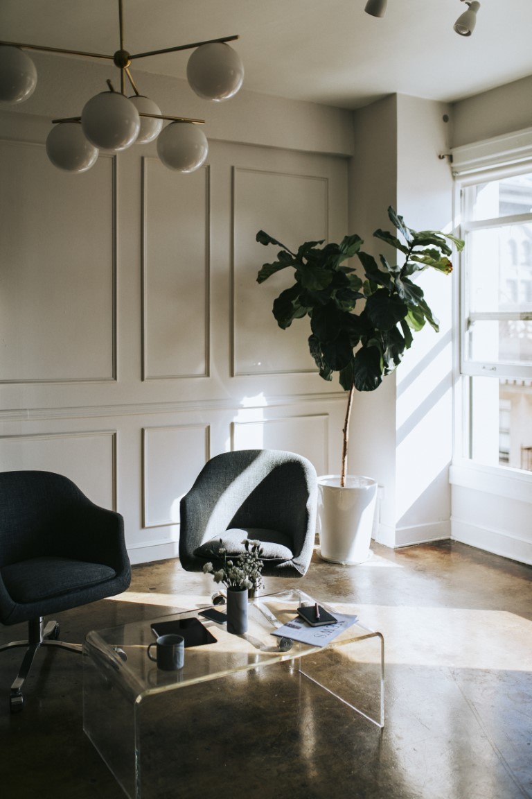 Two blue chairs in a living room