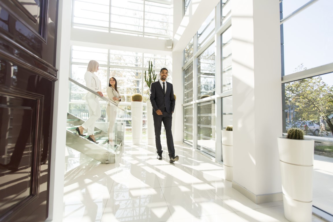 Young people walking in the office